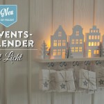 Adventskalender basteln mit beleuchteten Mini-Häusern