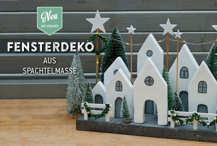 DIY: weihnachtliche Fensterdeko mit  kleinen Häuschen aus Spachtelmasse
